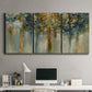 Three-panel canvas wall art featuring earth toned abstract leaf textures, displayed above a desk in a home office.