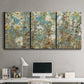 Three-panel canvas wall art featuring abstract flowering vine pattern, displayed above a desk in a home office.