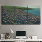 Three-panel canvas wall art featuring calm coastal landscape sanctuary, displayed above a desk in a home office.