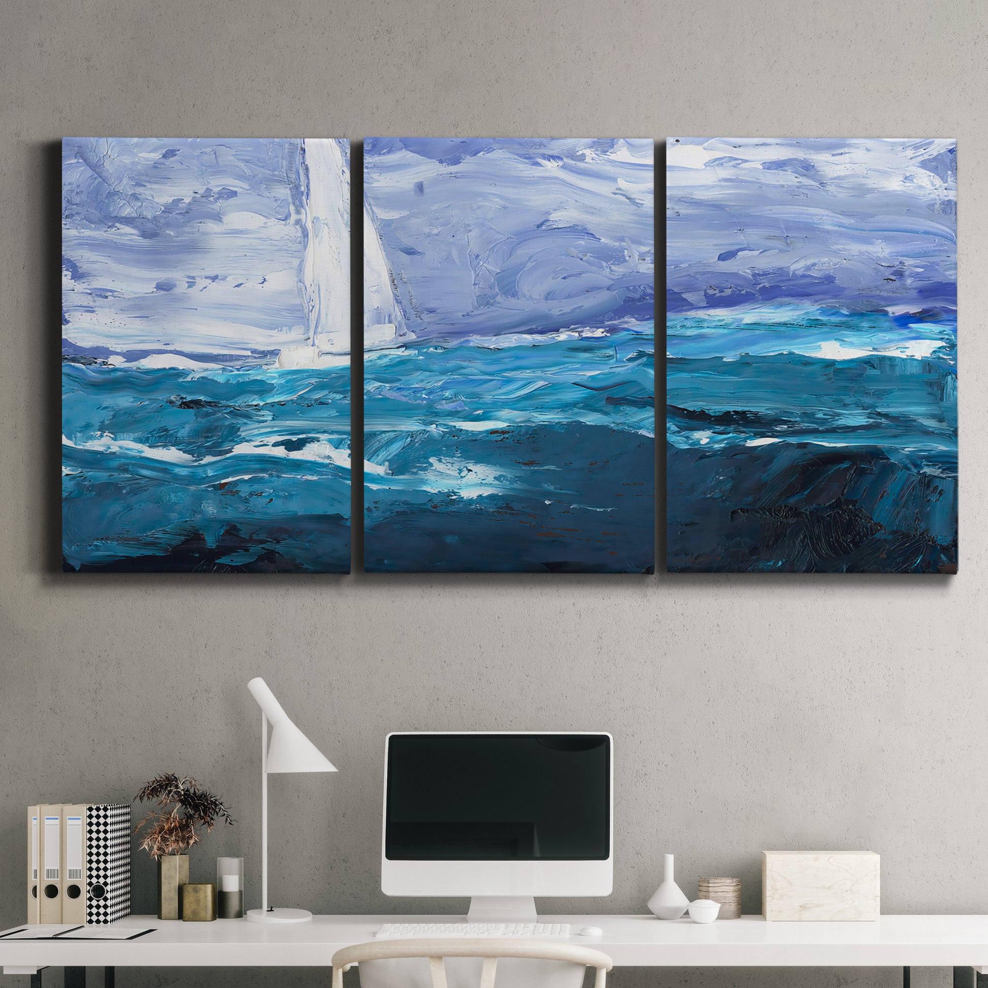 Three-panel canvas wall art featuring impressionist nautical harbor scene, displayed above a desk in a home office.
