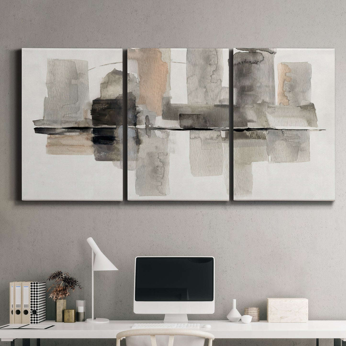 Three-panel canvas wall art featuring urban abstract watercolor oasis, displayed above a desk in a home office.