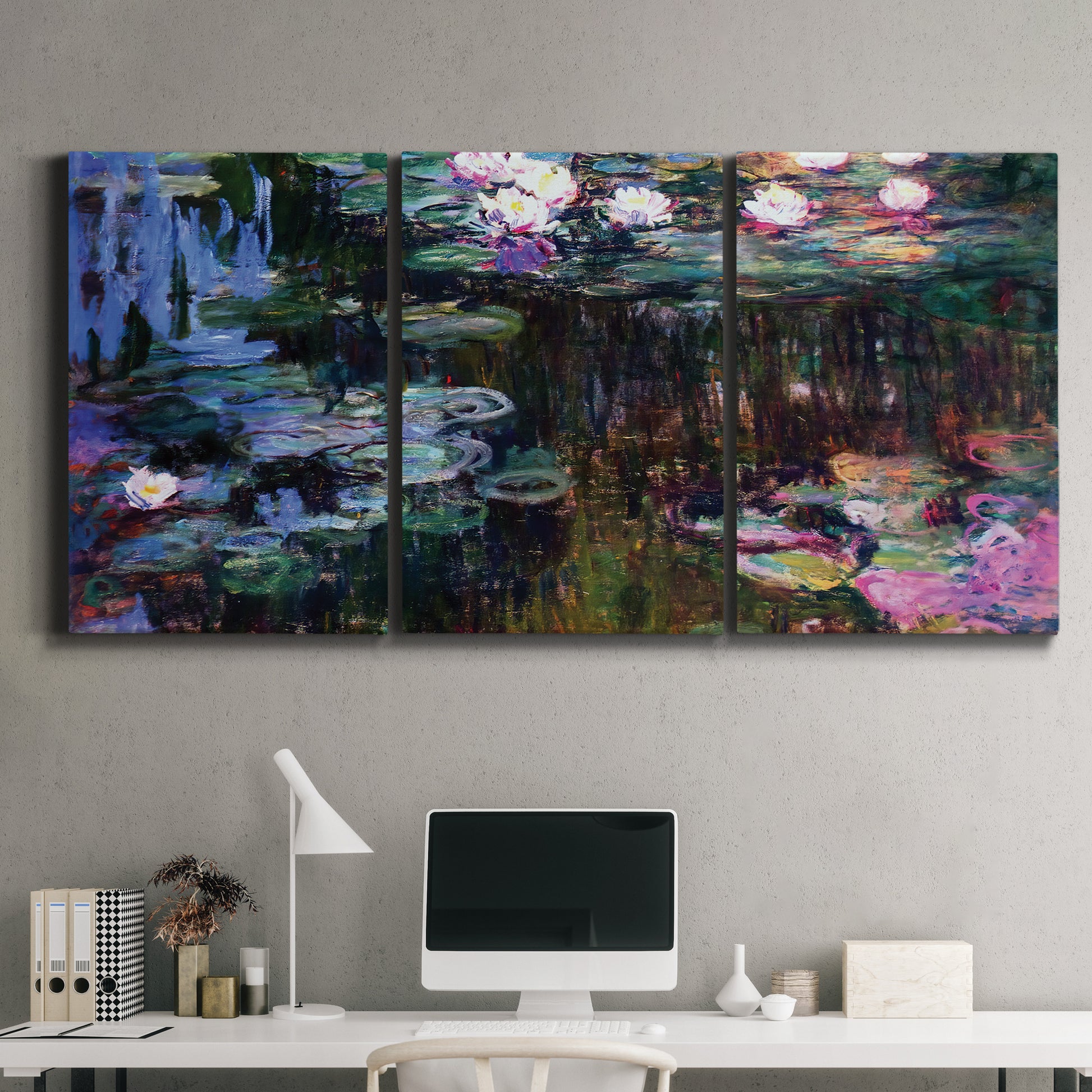 Three-panel canvas wall art featuring water lilies with willow reflections, displayed above a desk in a home office.