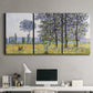 Three-panel canvas wall art featuring sunlight filtering through tall poplars, displayed above a desk in a home office.