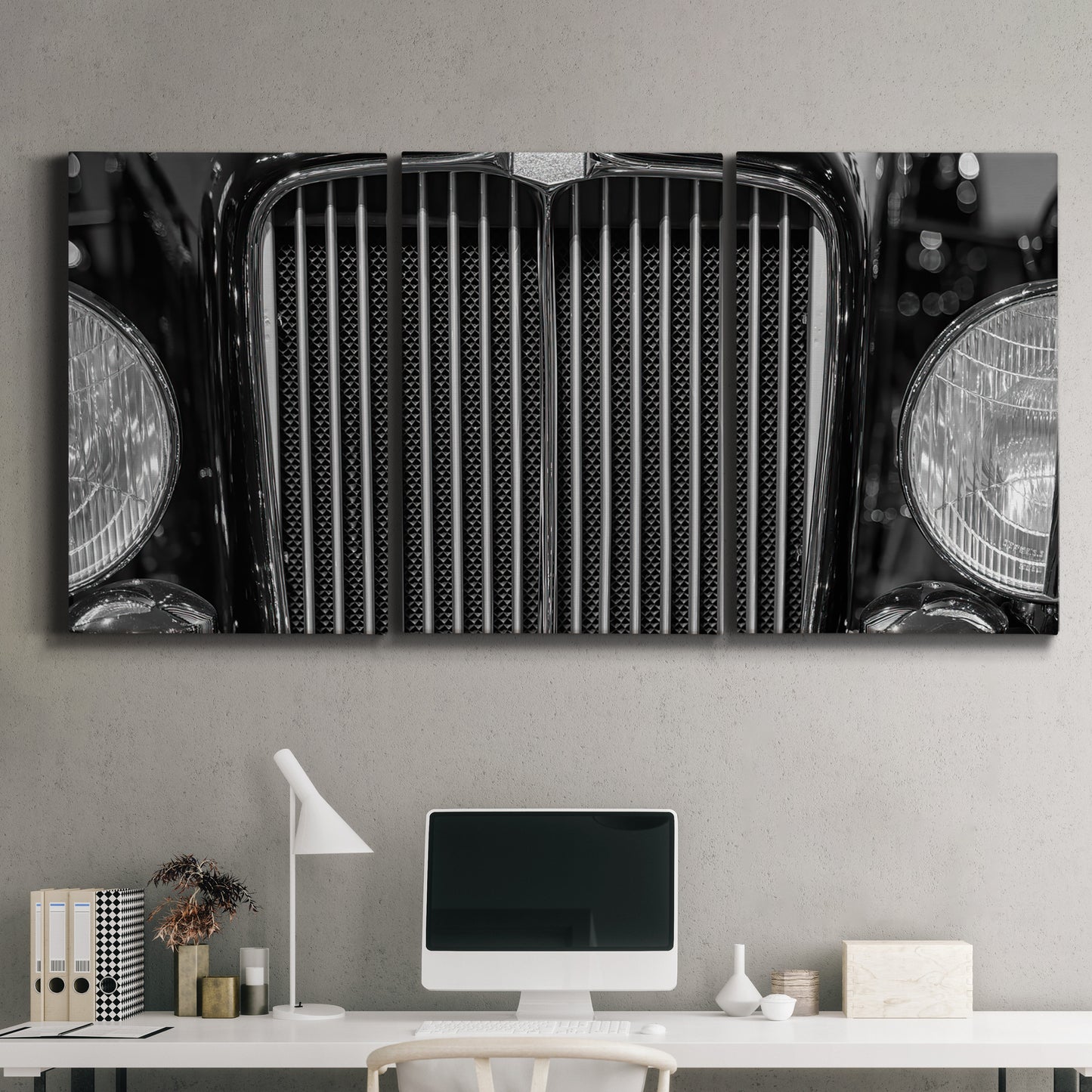 Three-panel canvas wall art featuring vintage car grille detail, displayed above a desk in a home office.