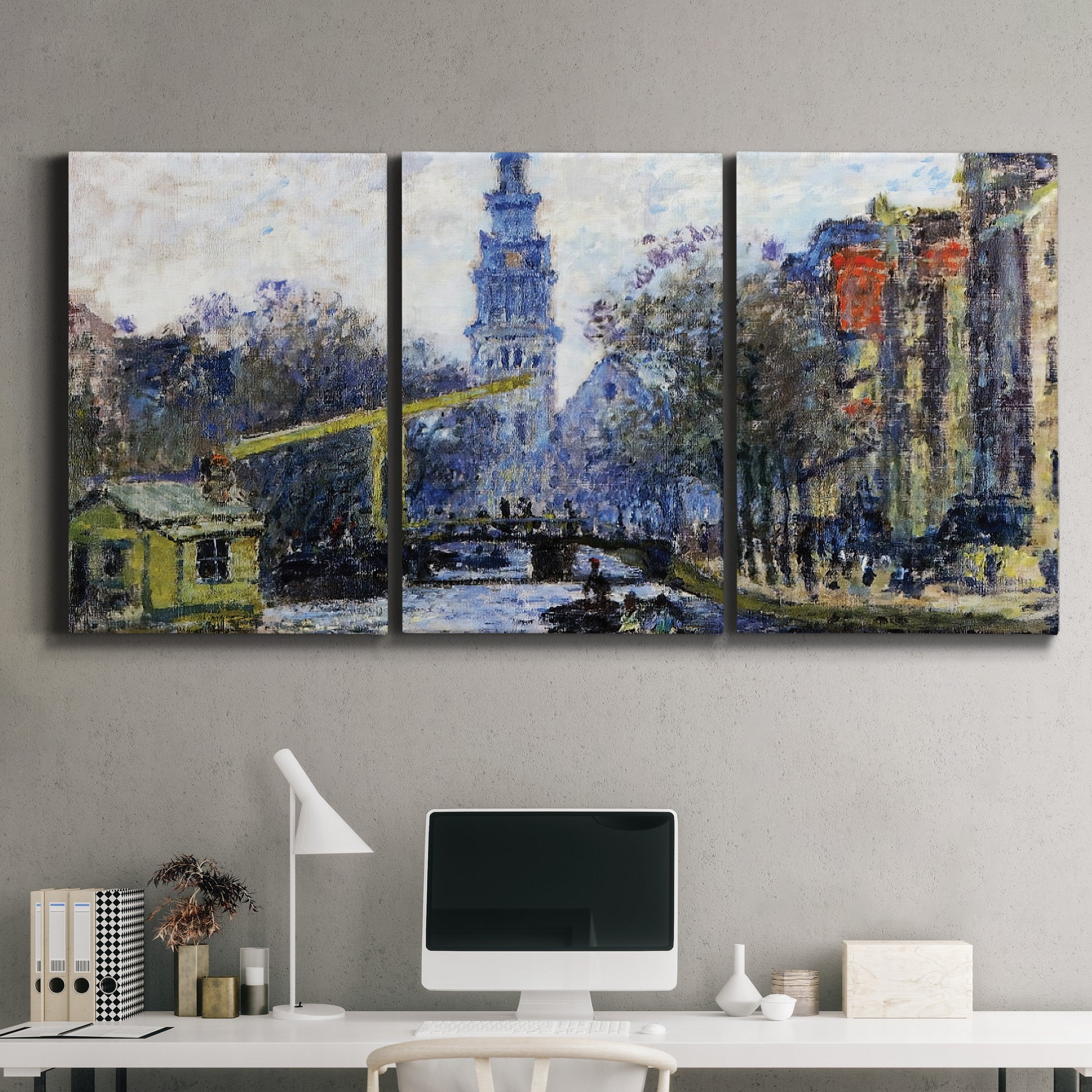 Three-panel canvas wall art featuring historic tower beside canal, displayed above a desk in a home office.