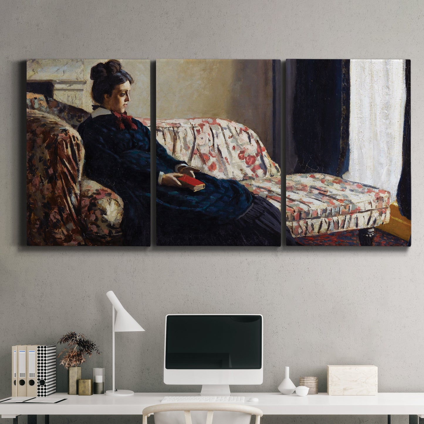 Three-panel canvas wall art featuring woman resting on sofa indoors, displayed above a desk in a home office.