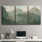 Three-panel canvas wall art featuring autumn storm over rolling landscape, displayed above a desk in a home office.