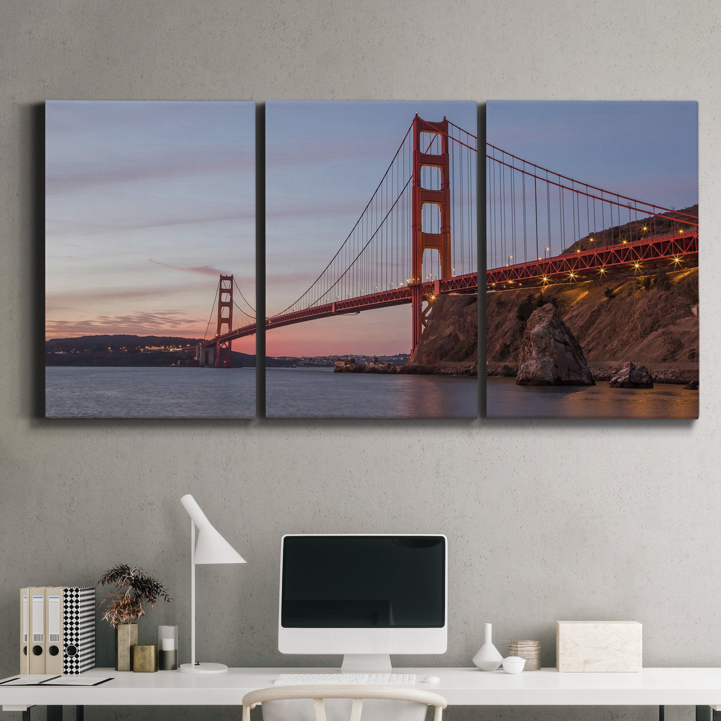 Three-panel canvas wall art featuring golden gate bridge spanning bay, displayed above a desk in a home office.