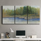 Three-panel canvas wall art featuring riverbank landscape with trees, displayed above a desk in a home office.