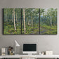 Three-panel canvas wall art featuring woodland forest scene with tall trees, displayed above a desk in a home office.