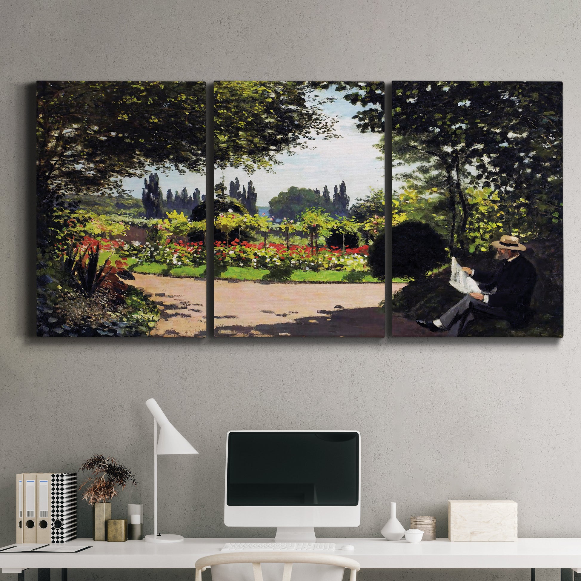 Three-panel canvas wall art featuring coastal garden overlooking sea, displayed above a desk in a home office.