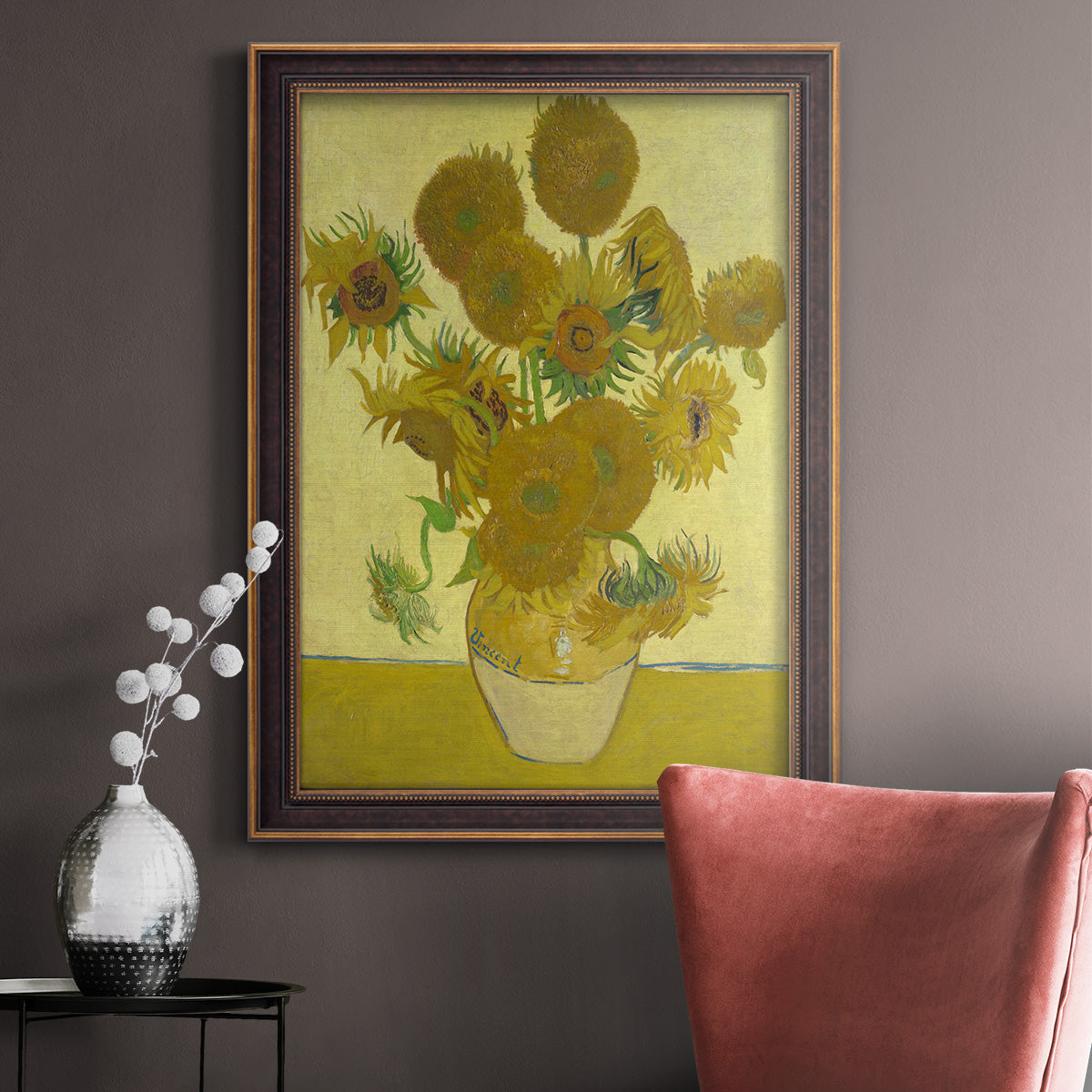 Impressionist sunflower still life painting by Vincent van Gogh in an ornate bronzed mahogany wood frame displayed in a neutral interior setting.