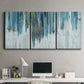 Three-panel canvas wall art featuring wide pastoral valley landscape, displayed above a desk in a home office.