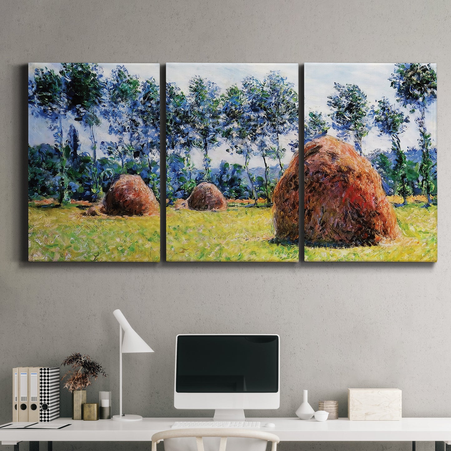 Three-panel canvas wall art featuring harvested grainstacks in field, displayed above a desk in a home office.