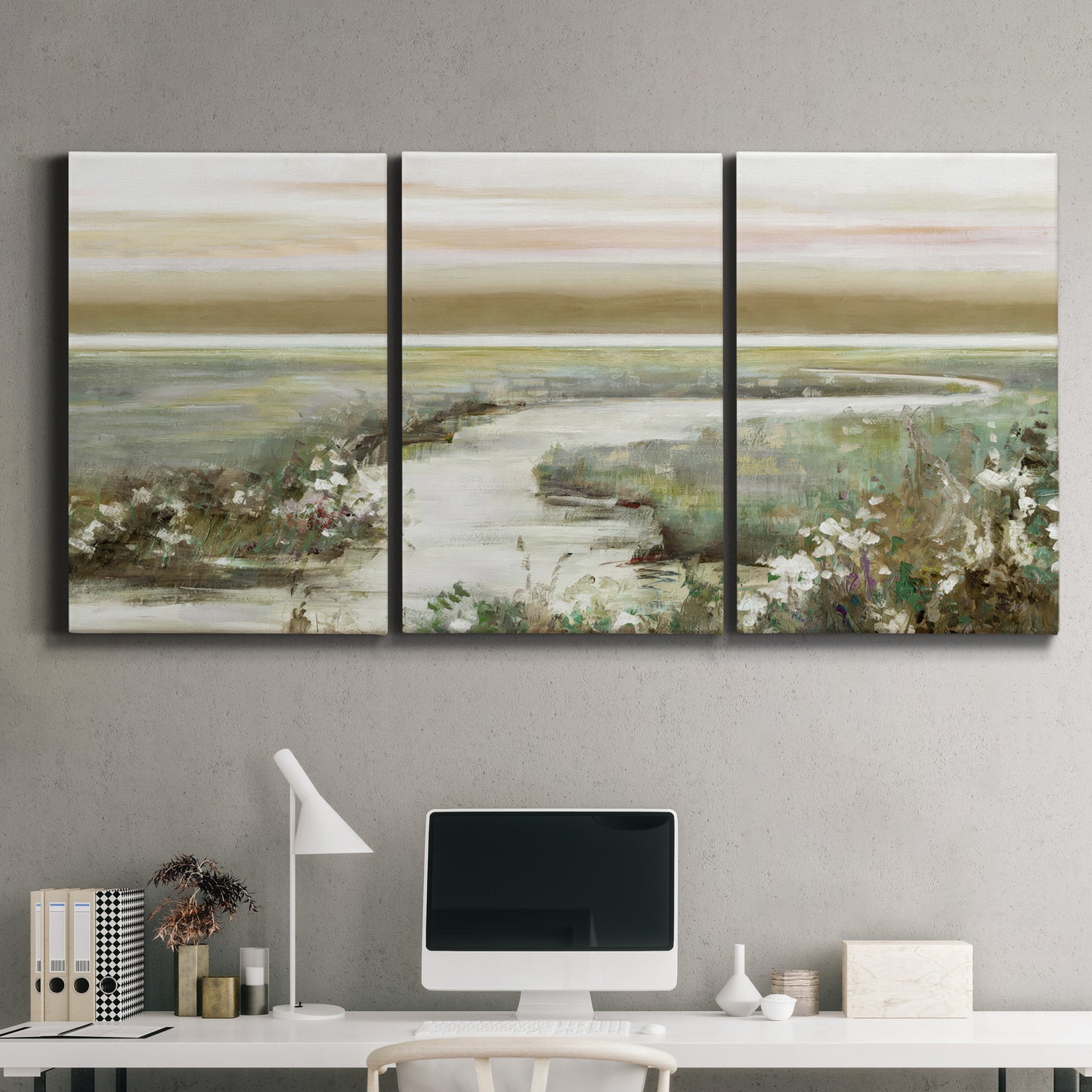 Three-panel canvas wall art featuring pastoral fields under soft sunrise, displayed above a desk in a home office.