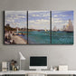 Three-panel canvas wall art featuring river basin with boats, displayed above a desk in a home office.