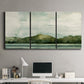 Three-panel canvas wall art featuring riverbank watercolor landscape, displayed above a desk in a home office.