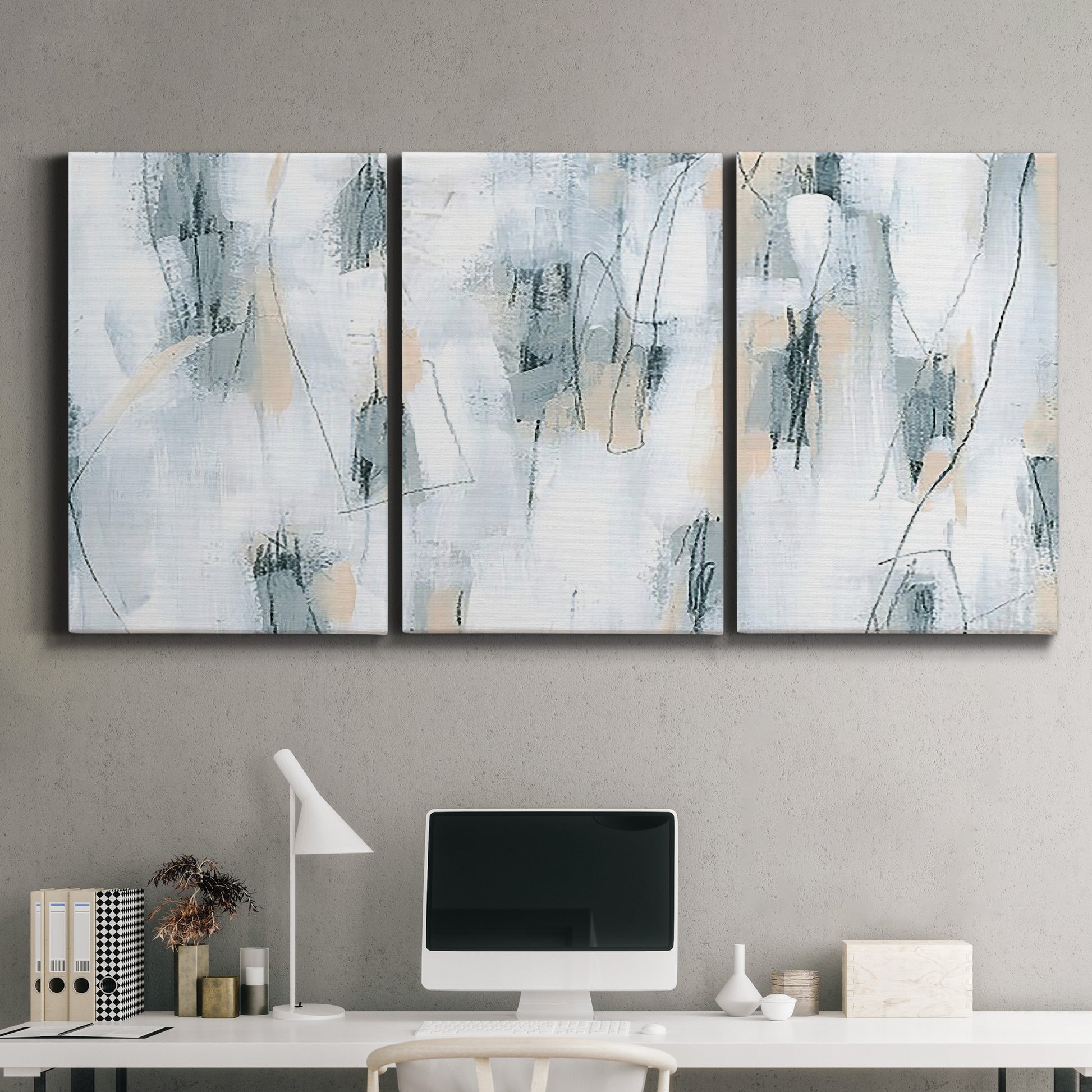 Three-panel canvas wall art featuring industrial textured abstract hatch patterns, displayed above a desk in a home office.
