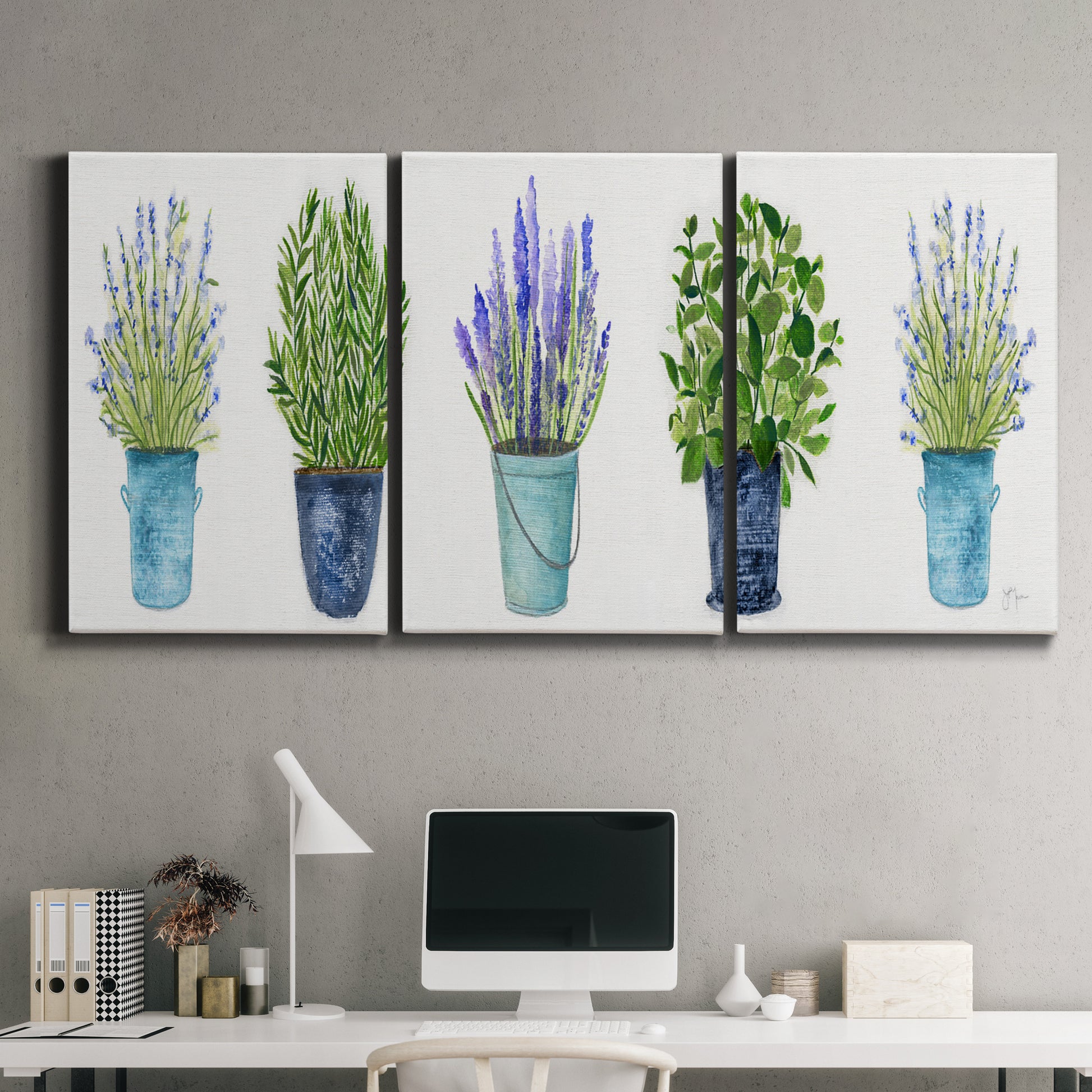 Three-panel canvas wall art featuring minimal monochrome abstract forms, displayed above a desk in a home office.