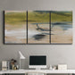 Three-panel canvas wall art featuring minimal abstract water reflections, displayed above a desk in a home office.