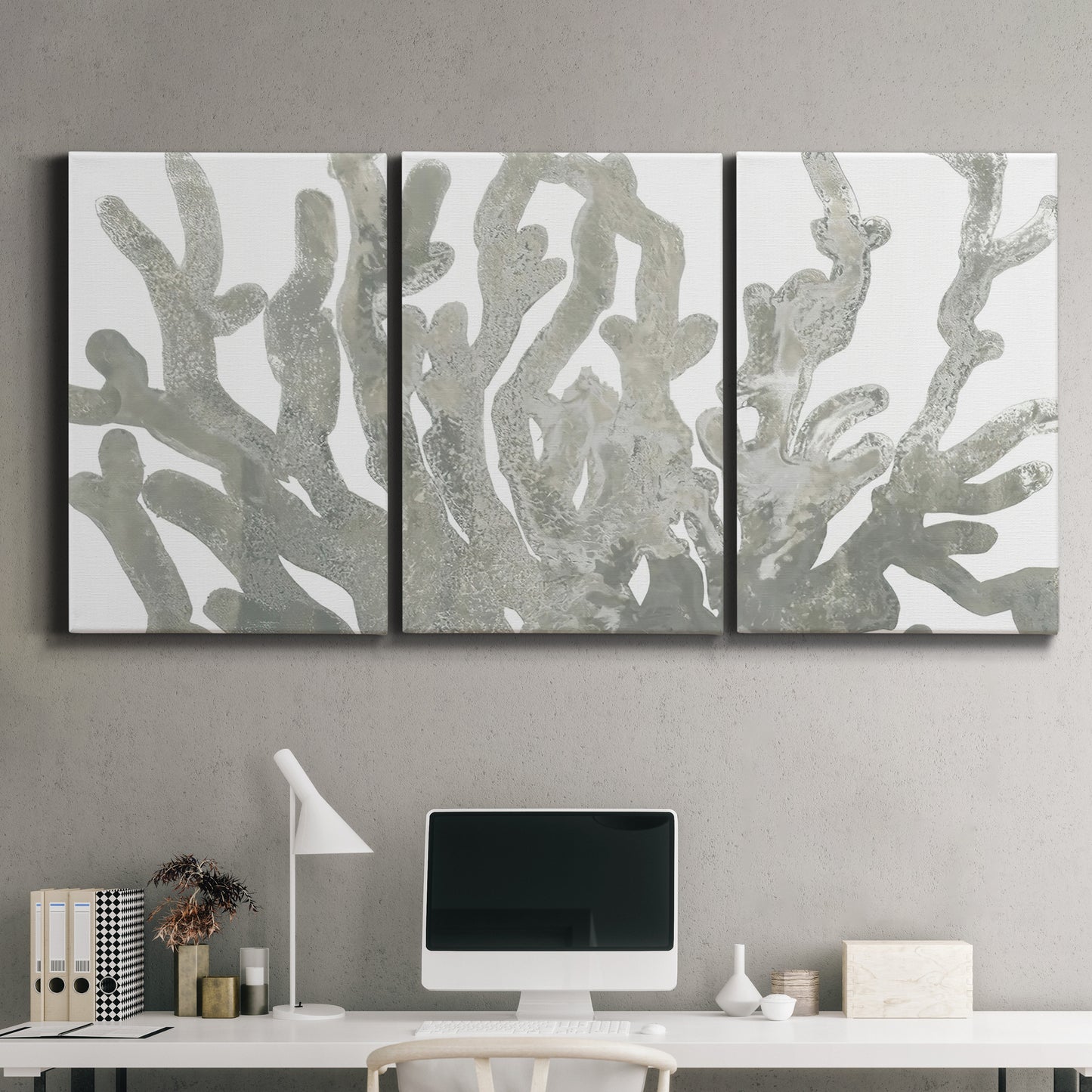 Three-panel canvas wall art featuring monochrome coral texture study, displayed above a desk in a home office.