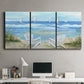 Three-panel canvas wall art featuring peaceful coastal landscape escape, displayed above a desk in a home office.