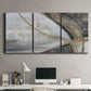 Three-panel canvas wall art featuring spiraling abstract vortex motion, displayed above a desk in a home office.