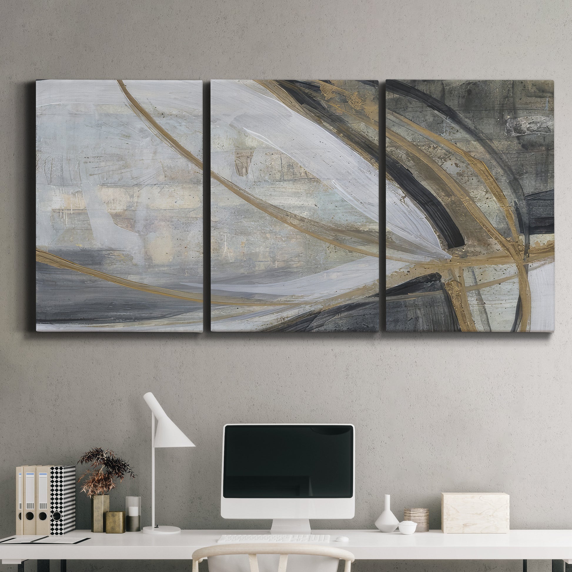 Three-panel canvas wall art featuring spiraling abstract vortex motion, displayed above a desk in a home office.