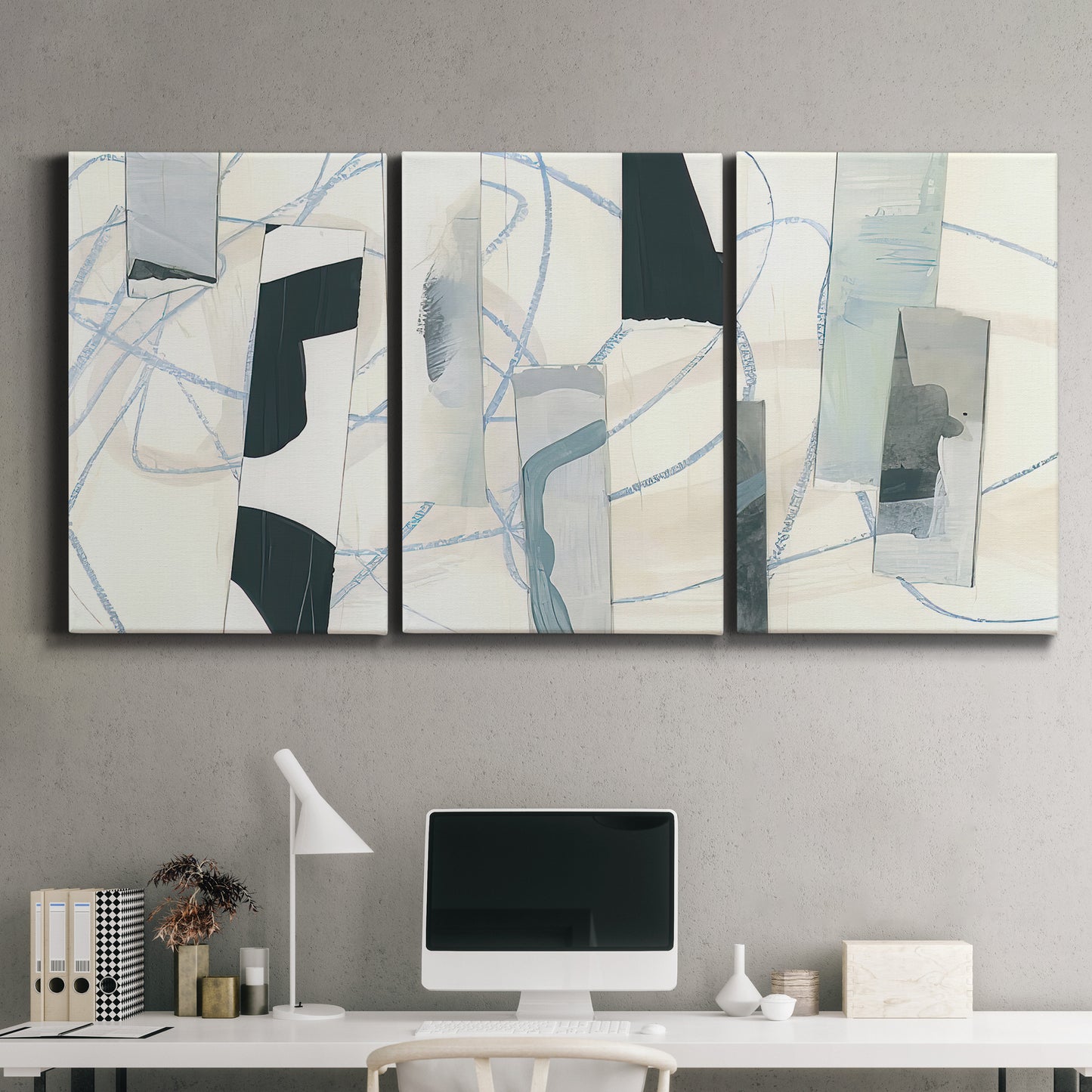 Three-panel canvas wall art featuring interwoven icy abstract linear forms, displayed above a desk in a home office.