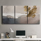 Three-panel canvas wall art featuring abstract watercolor with gold accents, displayed above a desk in a home office.