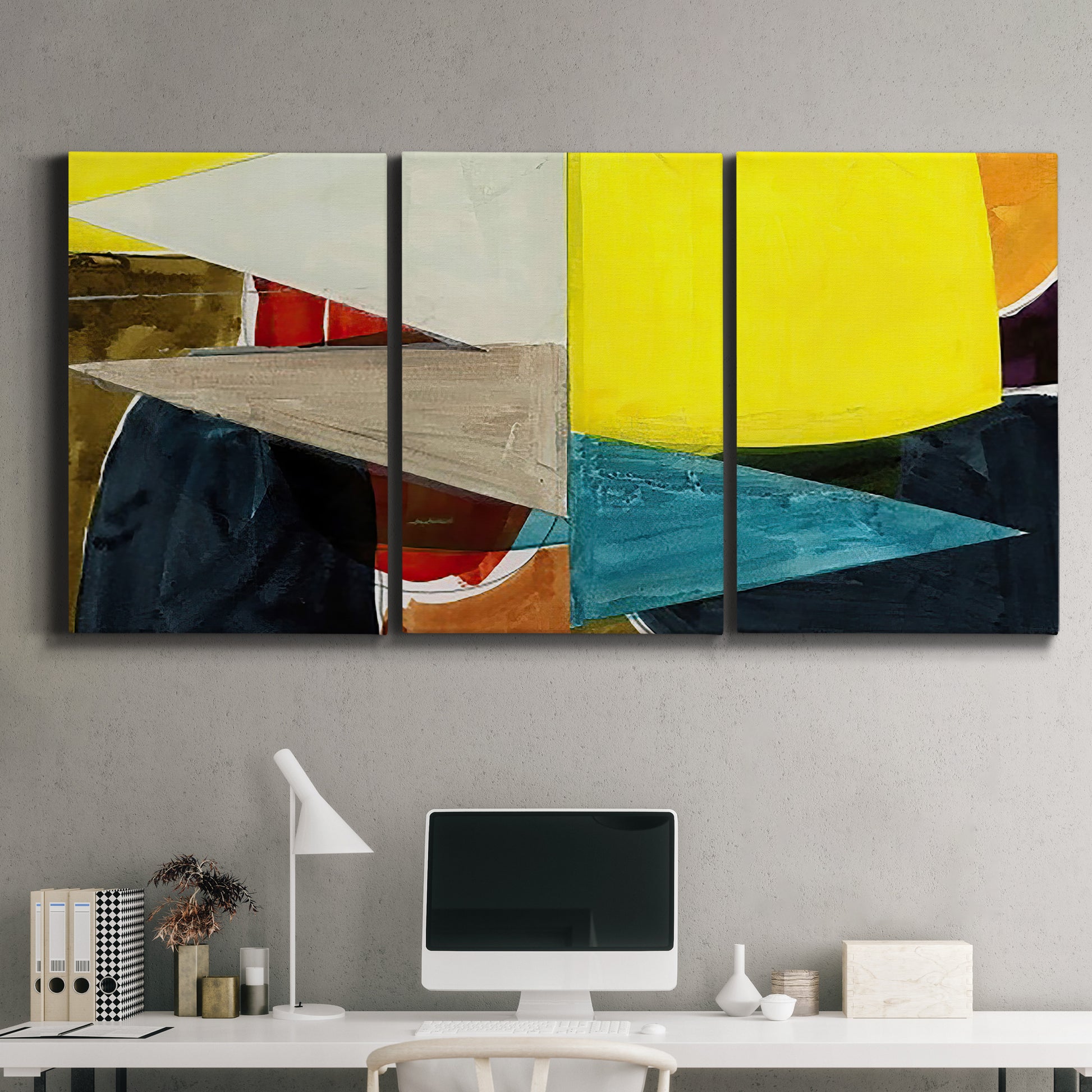Three-panel canvas wall art featuring geometric mid century abstract blocks, displayed above a desk in a home office.