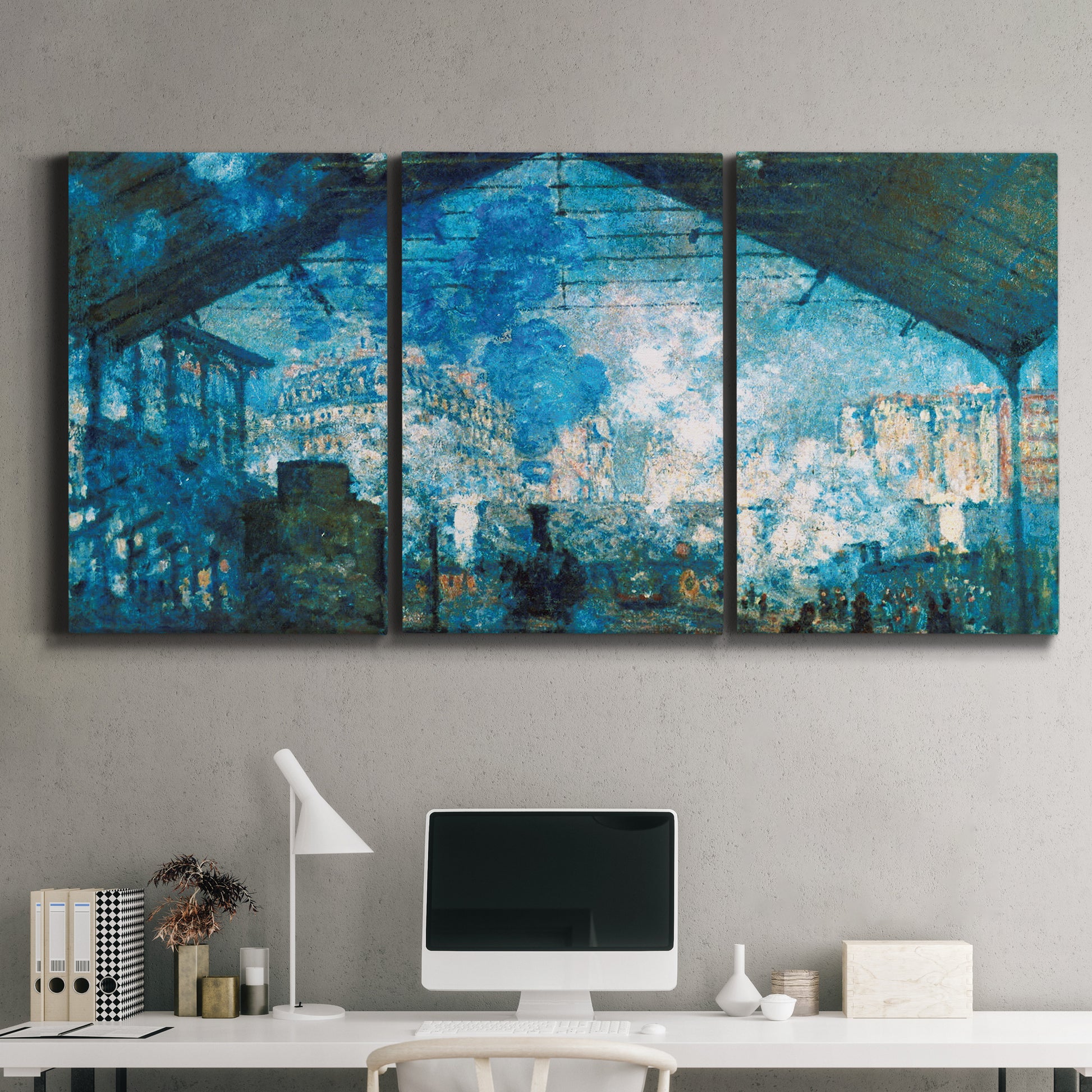 Three-panel canvas wall art featuring railway station filled with steam, displayed above a desk in a home office.