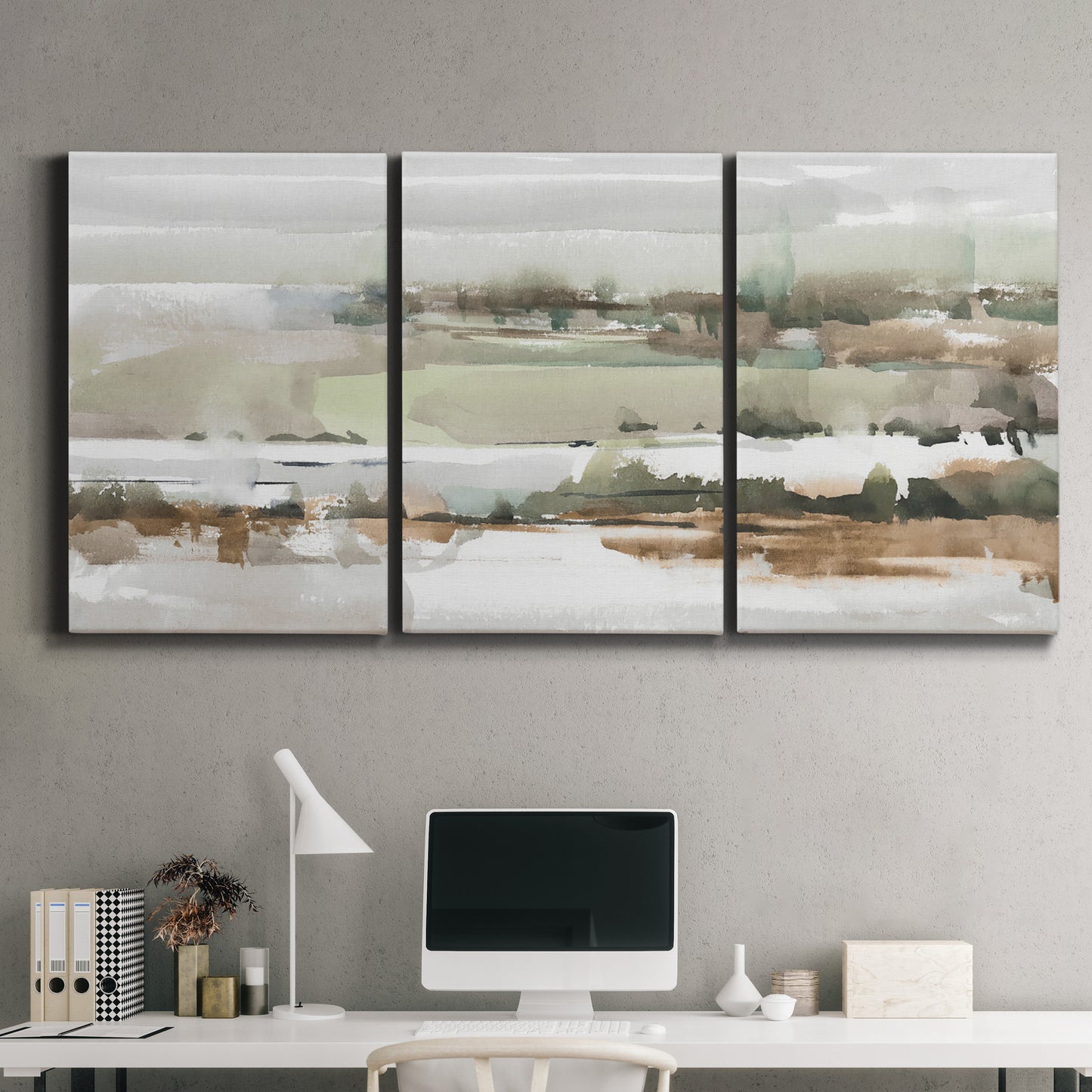Three-panel canvas wall art featuring layered turquoise and earth tones abstract, displayed above a desk in a home office.