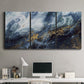 Three-panel canvas wall art featuring soft abstract landscape anticipation tones, displayed above a desk in a home office.