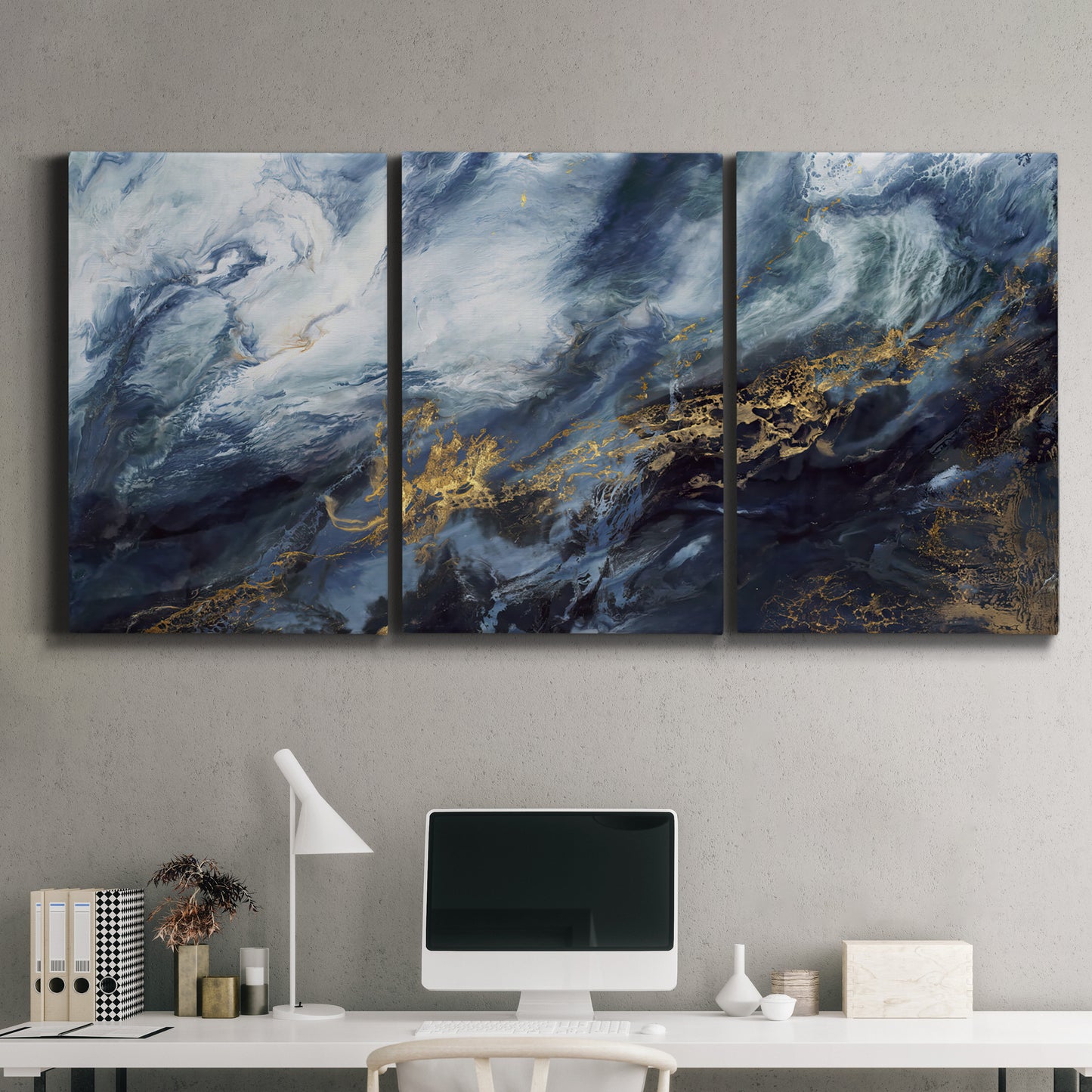 Three-panel canvas wall art featuring soft abstract landscape anticipation tones, displayed above a desk in a home office.
