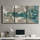 Three-panel canvas wall art featuring layered mineral abstract textures, displayed above a desk in a home office.