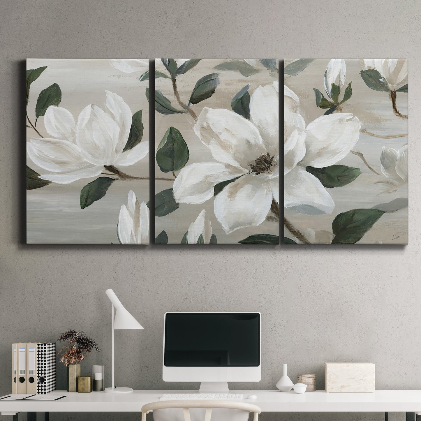 Three-panel canvas wall art featuring soft southern floral charm, displayed above a desk in a home office.