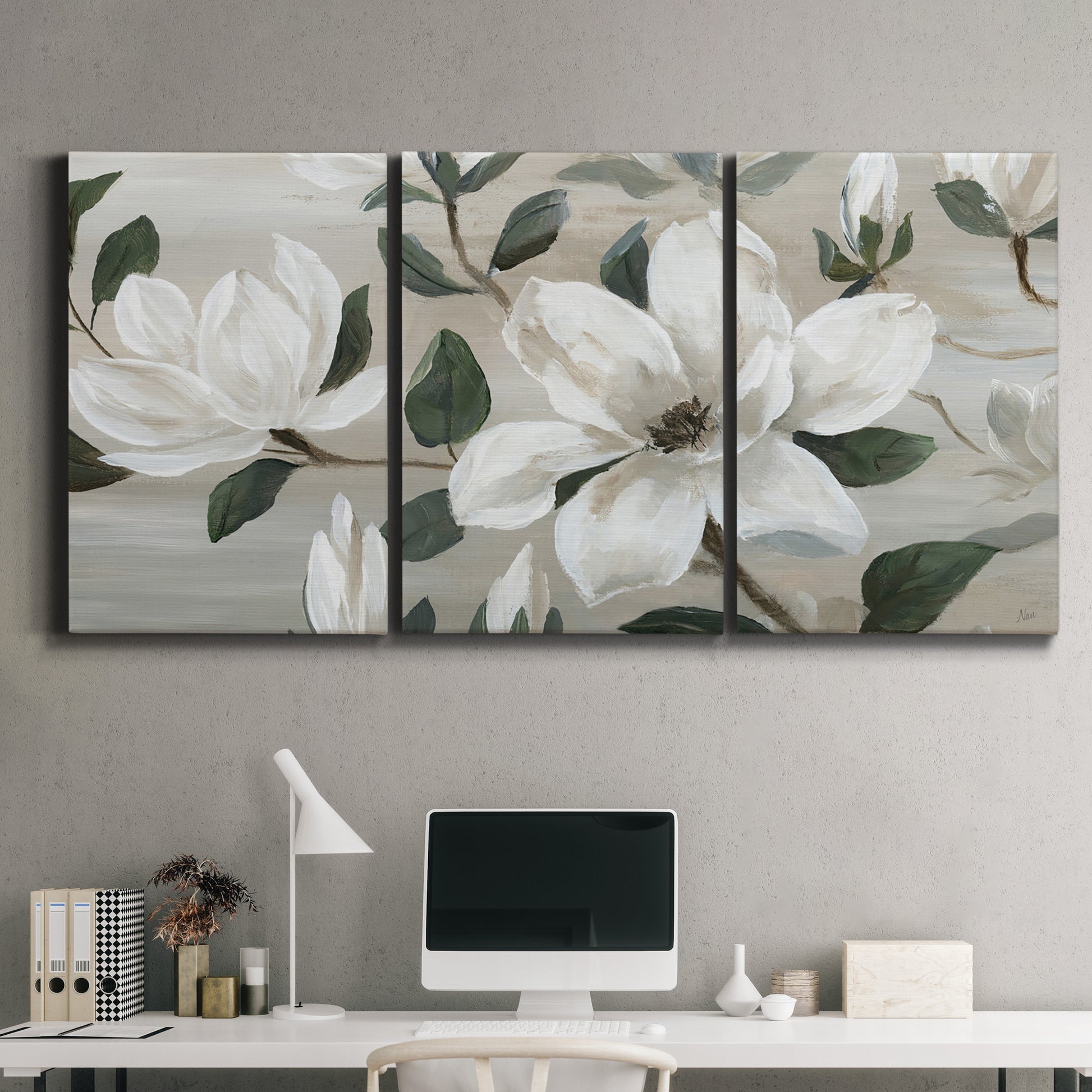 Three-panel canvas wall art featuring soft southern floral charm, displayed above a desk in a home office.