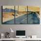 Three-panel canvas wall art featuring empty highway stretching through landscape, displayed above a desk in a home office.