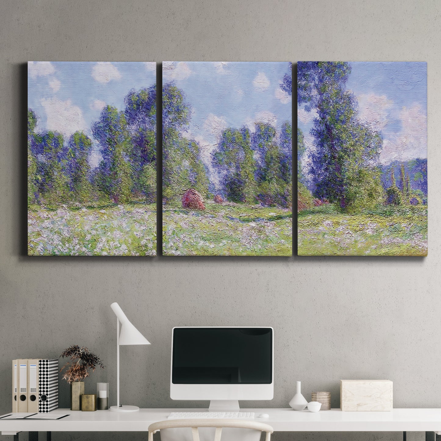 Three-panel canvas wall art featuring poppy field near garden village, displayed above a desk in a home office.