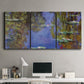 Three-panel canvas wall art featuring blue and purple water lily pond, displayed above a desk in a home office.