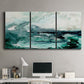 Three-panel canvas wall art featuring coastal abstract sea foam movement, displayed above a desk in a home office.
