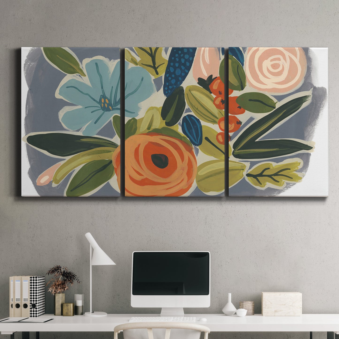 Three-panel canvas wall art featuring colorful botanical illustration, displayed above a desk in a home office.