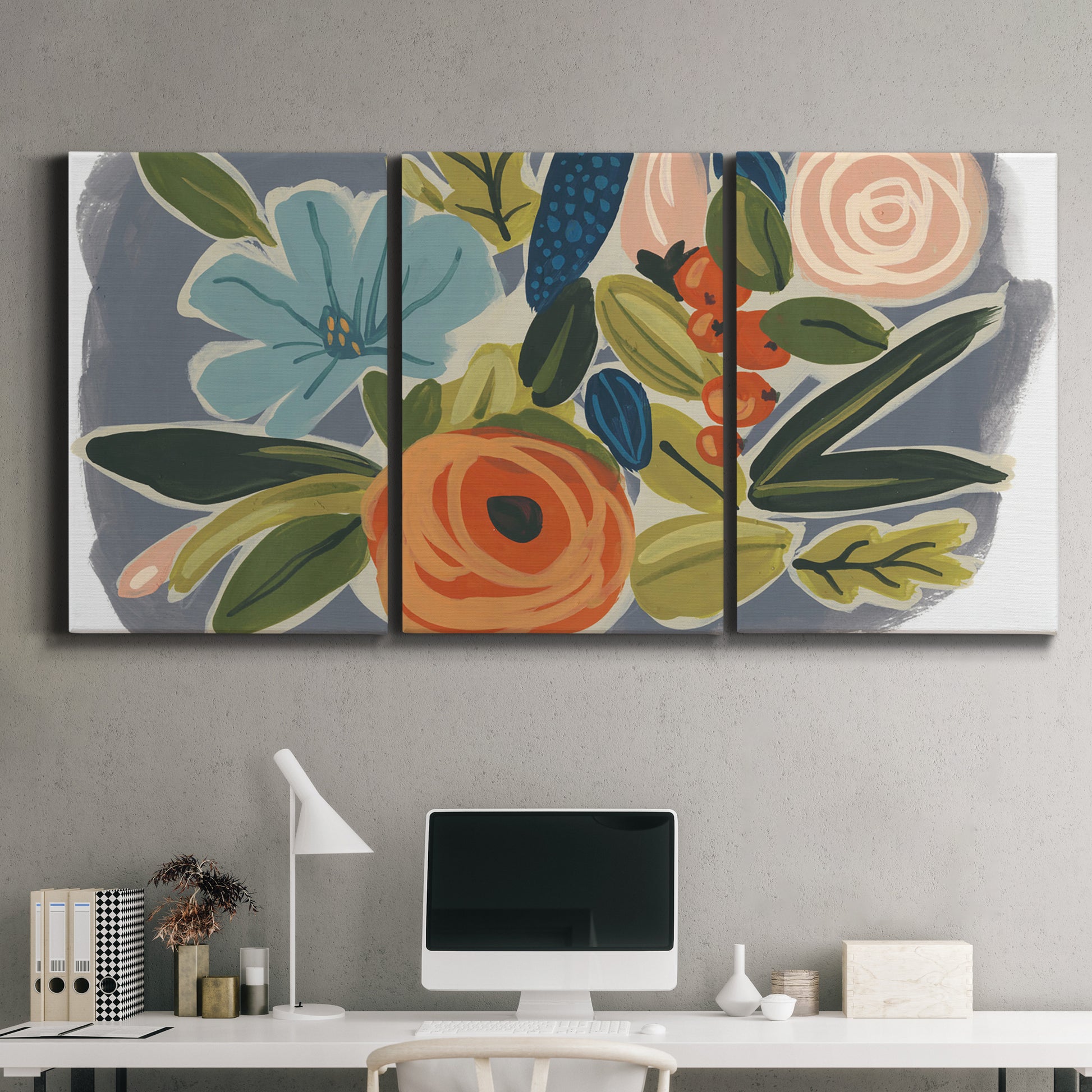 Three-panel canvas wall art featuring colorful botanical illustration, displayed above a desk in a home office.