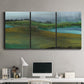 Three-panel canvas wall art featuring quiet contemplative landscape scene, displayed above a desk in a home office.