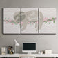 Three-panel canvas wall art featuring sloth with floral decorative elements, displayed above a desk in a home office.