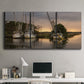 Three-panel canvas wall art featuring fishing trawlers on working harbor, displayed above a desk in a home office.