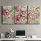 Three-panel canvas wall art featuring blooming climbing rose, displayed above a desk in a home office.