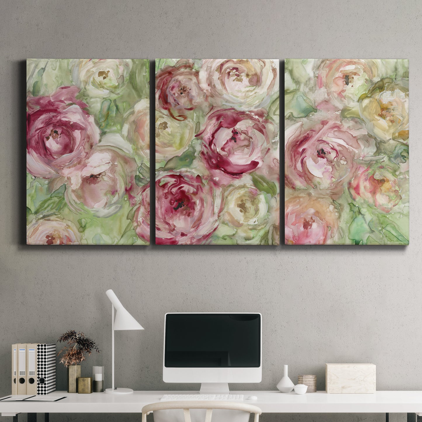 Three-panel canvas wall art featuring blooming climbing rose, displayed above a desk in a home office.