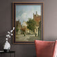Rustic European street scene painting by Adriaan Eversen in an ornate bronzed mahogany wood frame displayed in a neutral interior setting.